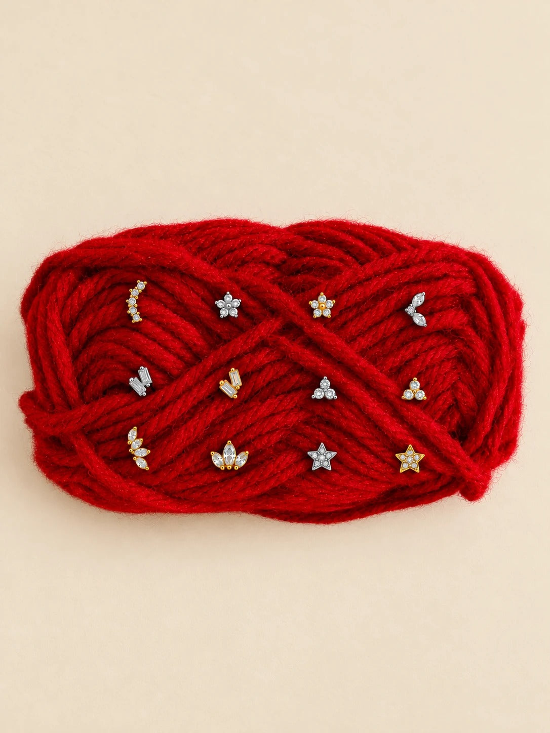 Ear Candy earrings on red yarn